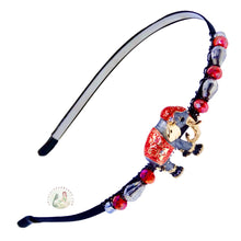 Load image into Gallery viewer, A flexible headband featuring an enameled elephant centerpiece with red and blue colors, accented with sparkly Austrian crystal beads, primarily in red and silver tones.