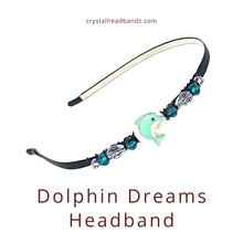 Load image into Gallery viewer, Dolphin Dreams headband with decorative elements on a white background
