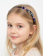 Load image into Gallery viewer, Young girl wearing black baby dragon side-decorated flexible headband, accented with fancy crystal beads. Baby Dragon Headband
