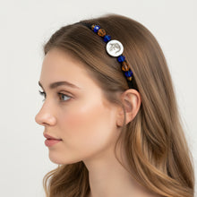Load image into Gallery viewer, girl wearing no-pinch headband side-embellished with a silver alligator on a mother of pearl bead, accented with fancy Czech crystal beads, Silver Gator Headband
