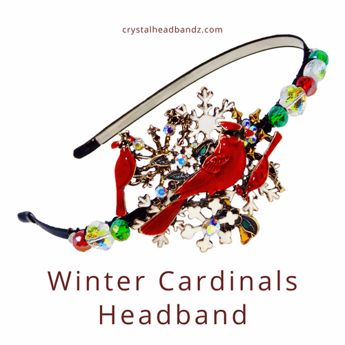 Decorative headband with red cardinals and snowflakes on a white background