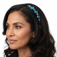Load image into Gallery viewer, Woman wearing a decorative headband with blue and clear gemstones on a white background
