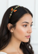 Load image into Gallery viewer, woman wearing a headband side-embellished with an enameled orange dragonfly centerpiece, accented with colorful sparkly crystal beads
