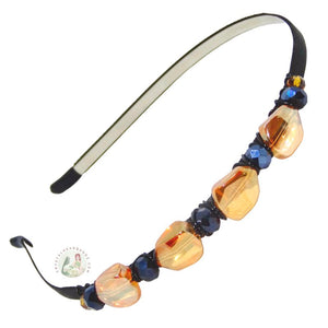 flexible headband side embellished with chunky, sparkly amber crystal beads