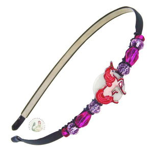 Pink enameled unicorn decorated flexible headband, side accented with fancy crystal beads. Enameled Unicorn Headband 