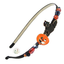 Load image into Gallery viewer, no-pinch Halloween headband embellished with an enameled black cat and pumpkin centerpiece, accented with black and orange sparkly Austrian crystal beads, Halloween Cat Headband

