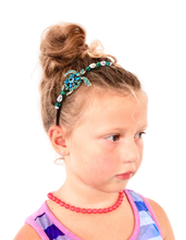 Load image into Gallery viewer, teal crystal turtle embellished flexible headband, accented with Austrian crystal beads with hair in a bun, Teal Crystal Turtle Headband

