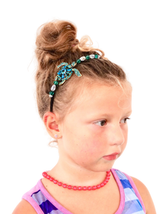 teal crystal turtle embellished flexible headband, accented with Austrian crystal beads with hair in a bun, Teal Crystal Turtle Headband